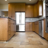 New Kitchen with Stainless Steel Refrigerator, Ovens and Dishwasher