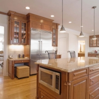 Modern Kitchen with Stainless Steel Refrigerator and Microwave